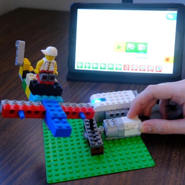 Casey Hunt building with Legos