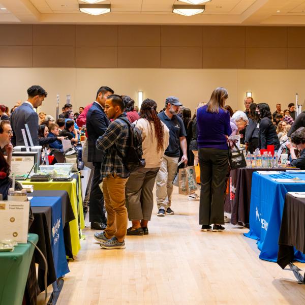 campus community members visit booths at the Health and Wellness Summit