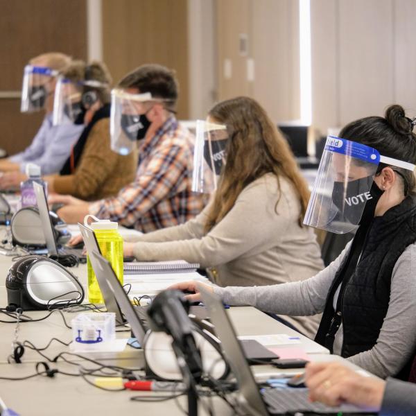 Poll workers. (Photo by Glenn Asakawa/University of Colorado)
