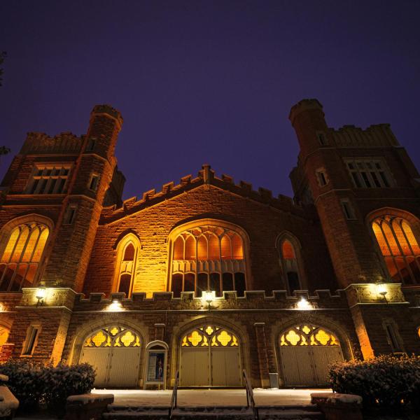 Exterior of Macky Auditorium at night