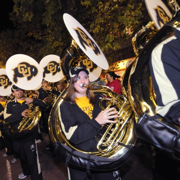The CU marching band plays at the Homecoming parade