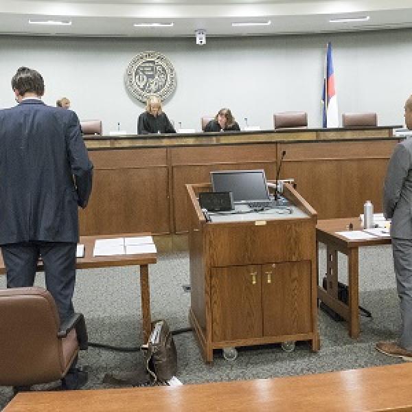 Lawyers in courtroom.