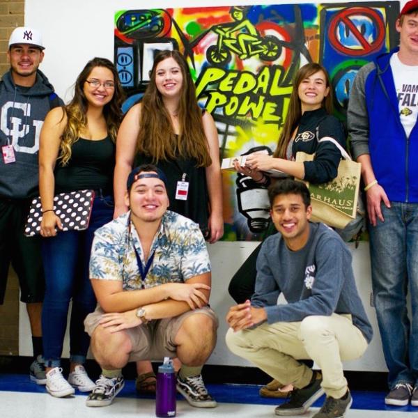 CU Boulder Public Achievement coaches take a break from their social action work with students at Centaurus High School.