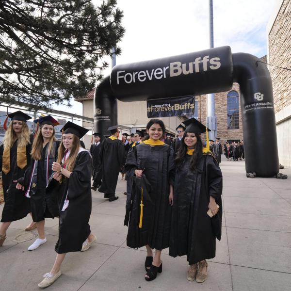CU Boulder graduates attending commencement ceremony
