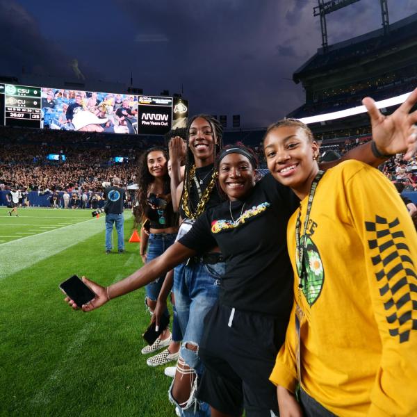 Students on the sidelines of the 2019 Rocky Mountain Showdown football game