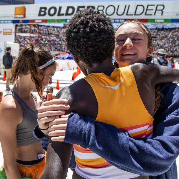 Racers celebrate at the finish line