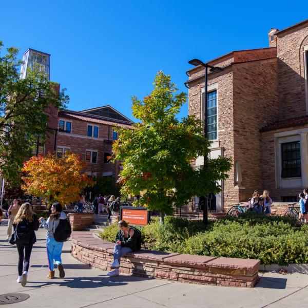 campus community members walking on campus