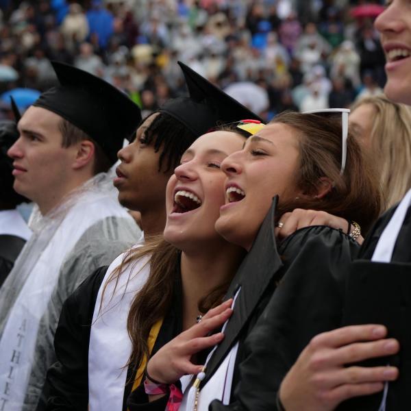 Graduates and their friends and family celebrate the achievement at the 2023 Spring Commencement on May 11, 2023. (Photo by Glenn J. Asakawa/University of Colorado)