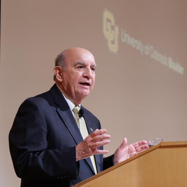 Chancellor Philip P. DiStefano speaks from a lecturn.