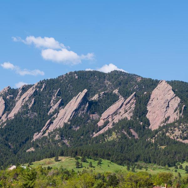 Flatirons and a blue sky