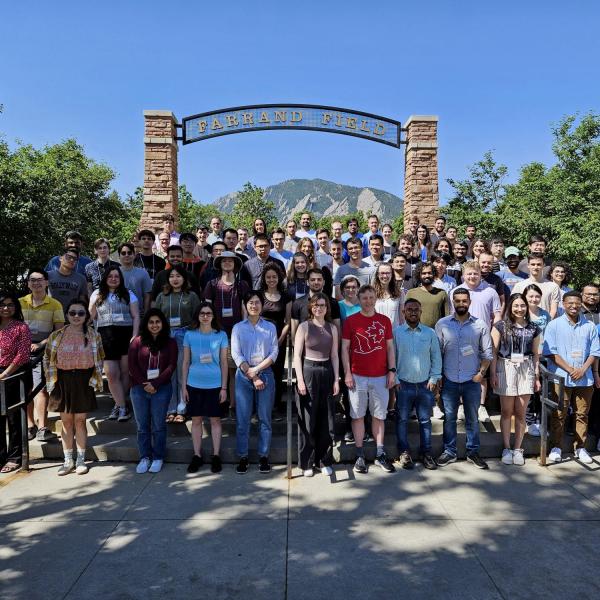 International graduate students group photo at Farrand Field