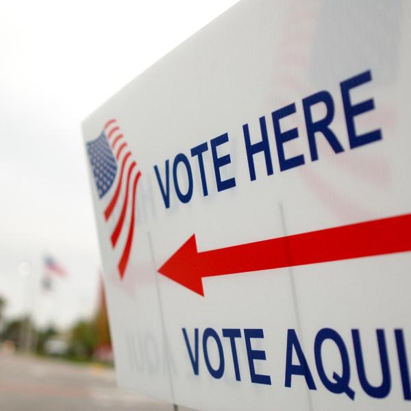 Sign with arrow pointing to voting area