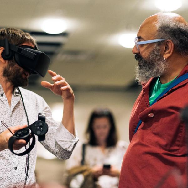A person using a virtual reality headset and controllers