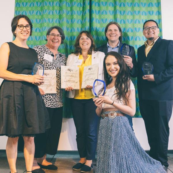 Members from CU Boulder's Department of Strategic Relations and Communications holding awards at the 2023 PRSA Gold Pick Award ceremony.