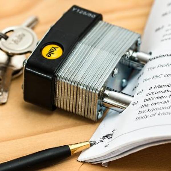 Print document bound with lock and key