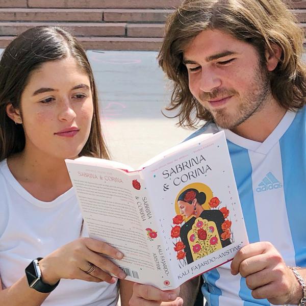 Two students reading Sabrina & Corina