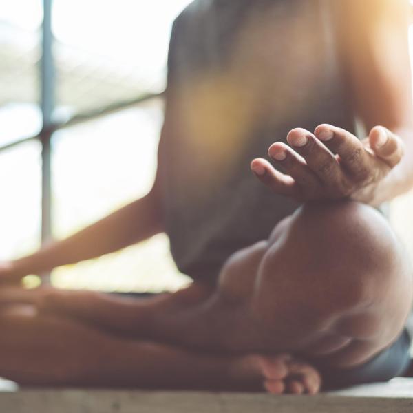 a person sitting in meditation