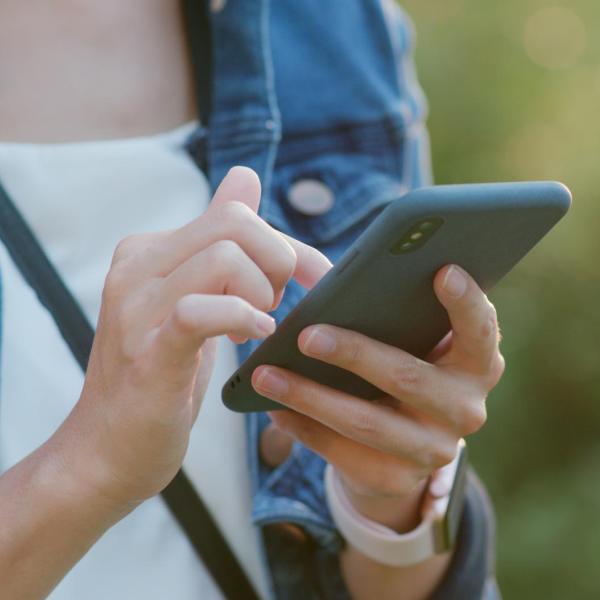 person reading a text message on their phone
