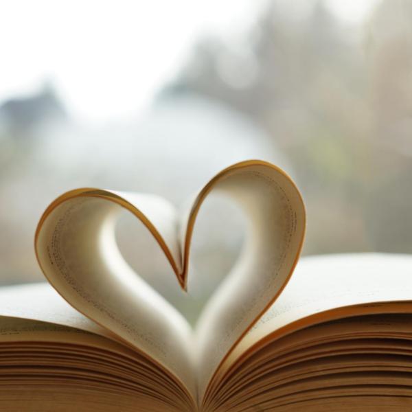 pages of a book shaped into a heart
