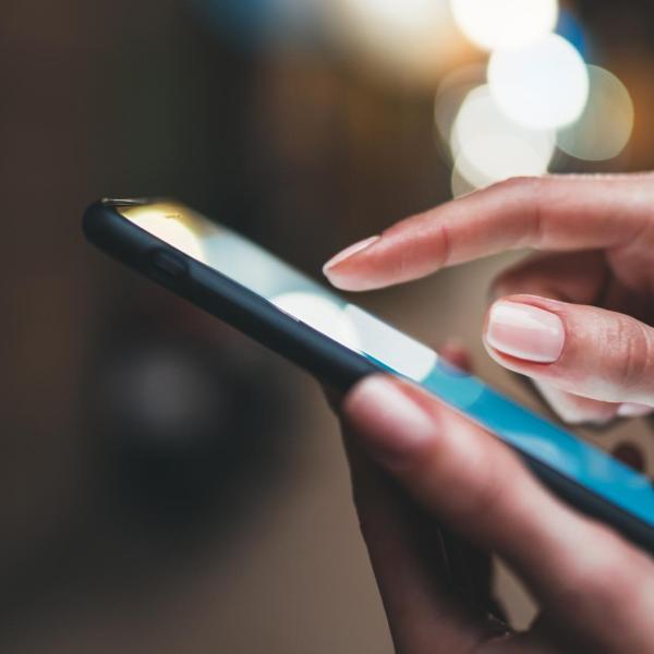 person reading text message