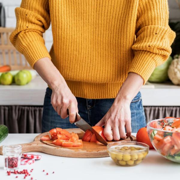 person cooking in a home kitchen