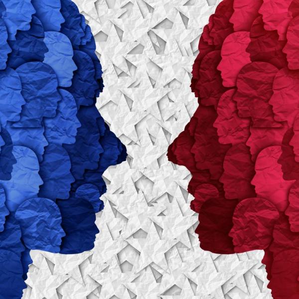 illustration of blue and red paper people cutouts facing off
