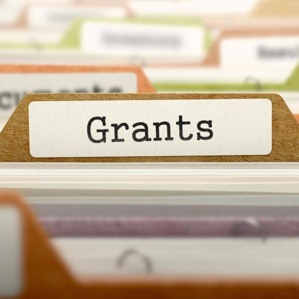 file folder labeled 'grants'