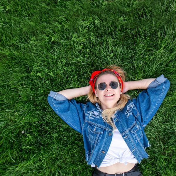 Person lying in the grass