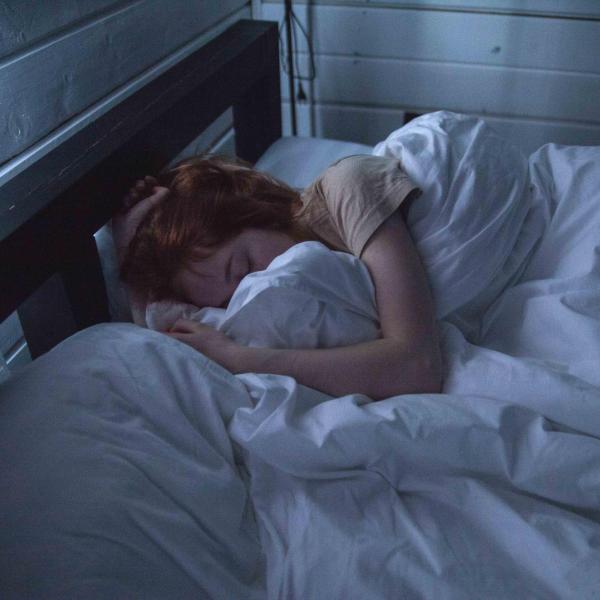 Woman sleeping in bed