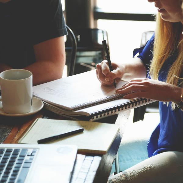 Group studying together in coffee shop