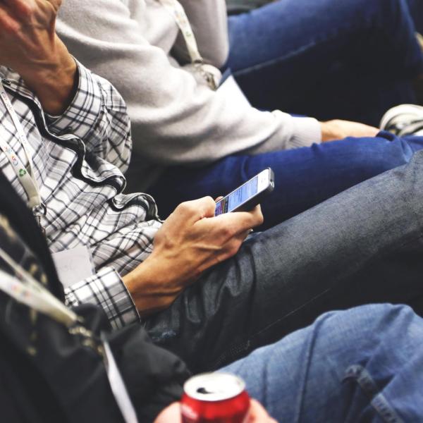 Person using mobile phone.