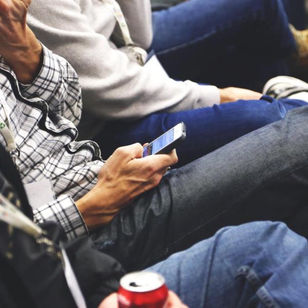 A person using a mobile phone