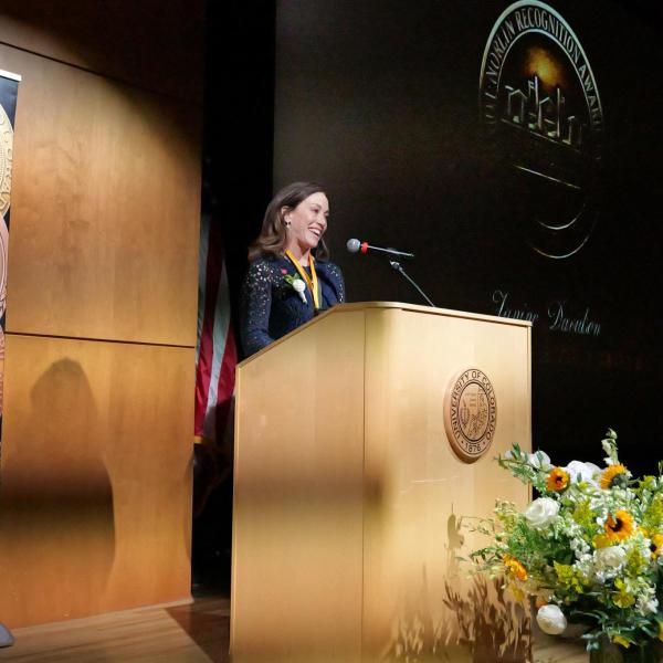 George Norlin Awardee Janine Davidson addresses the audience during the 2023 Alumni Awards
