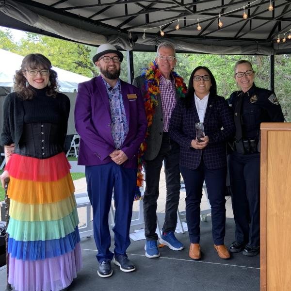 CUPD's Amber Snell receiving an award at Lavender Graduation