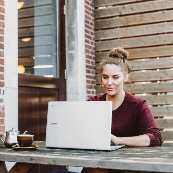 person working on laptop outside
