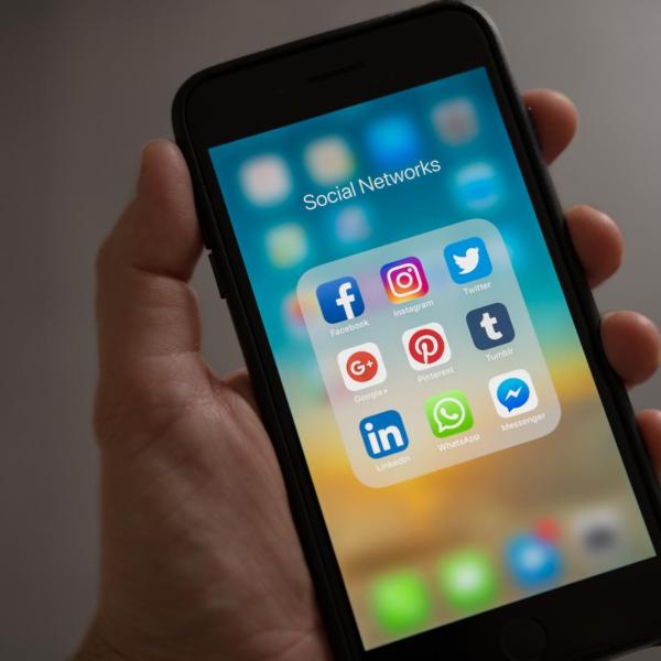 A cell phone with Facebook on it