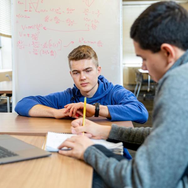 A student tutoring a fellow student as part of the ASAP tutoring program