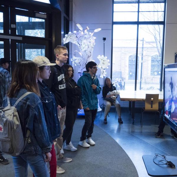 Visitors check out more than 100 student projects on display at the ATLAS expo. Photo by Patrick Campbell.