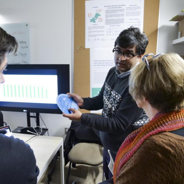 Students show their work during the ATLAS Institute Research Showcase. (Photo by Patrick Campbell/University of Colorado)