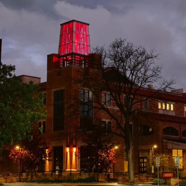 The ATLAS Building towers shines red to honor Coloradans lost to COVID-19 on Friday, May 15, 2020. (Photo by Casey A. Cass/University of Colorado)