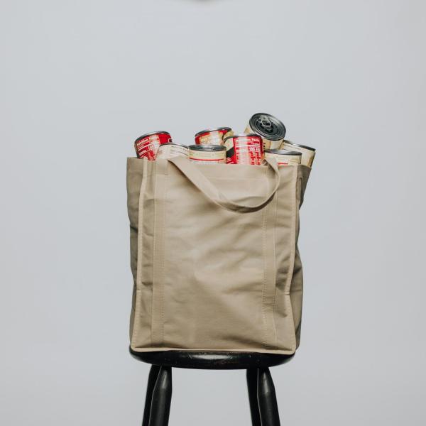 reusable grocery bag filled with canned food