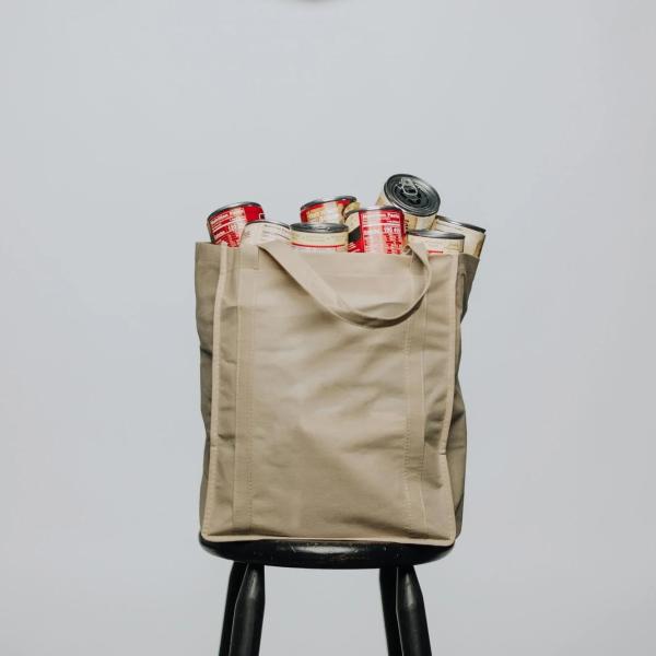 A canvas bag of canned goods.