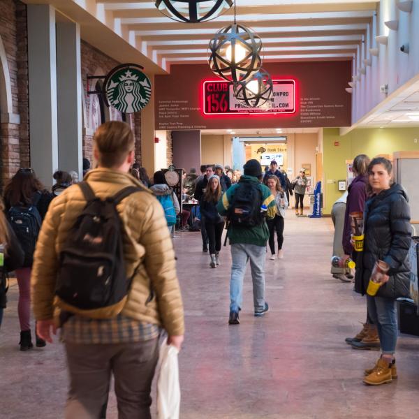 Students walk across the UMC