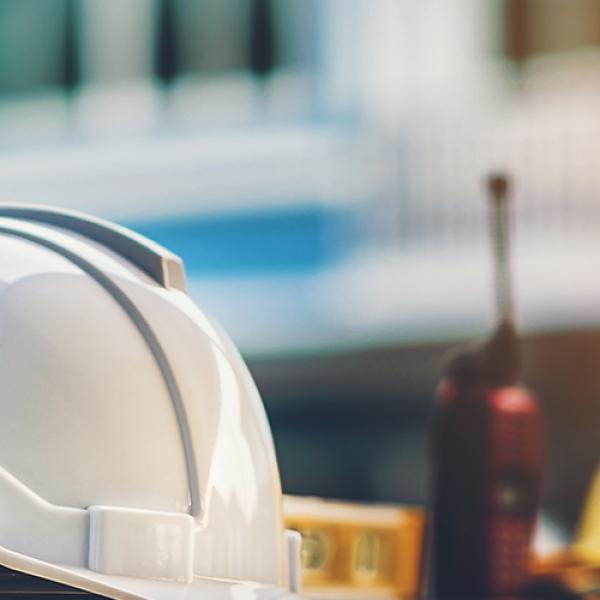 A hard hat and a two-way radio.