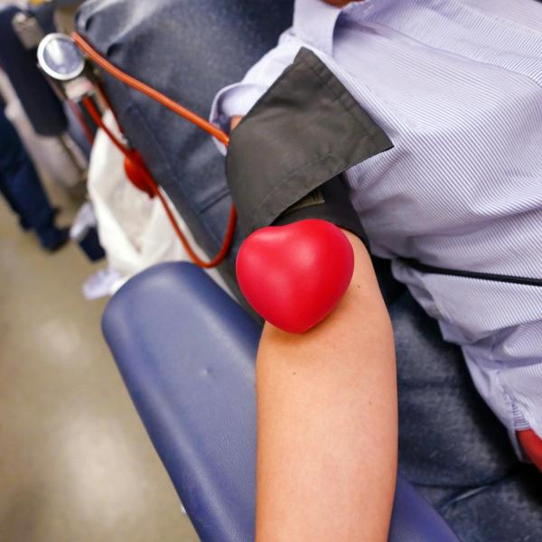 Person donating blood at a CU Boulder blood drive