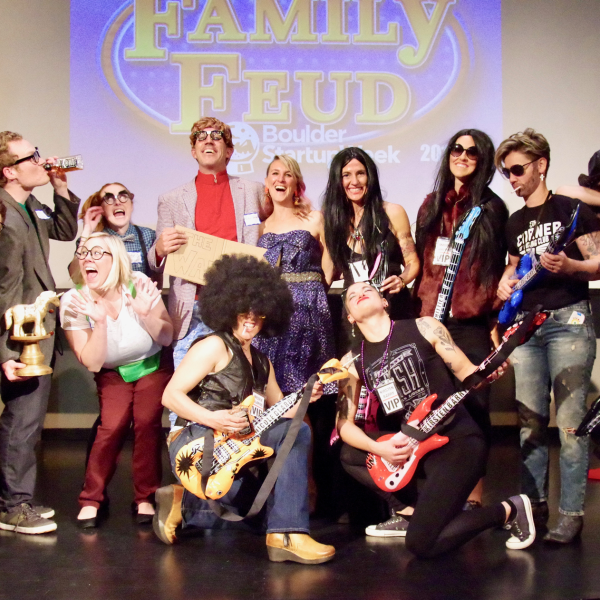 Group dressed up for Family Feud session at Boulder Startup Week