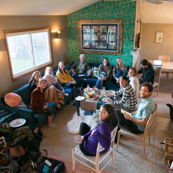 Graduate students gather at David Ciplet's home to share podcasts