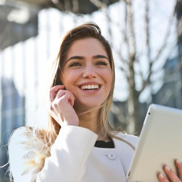 Young business woman talking on phone