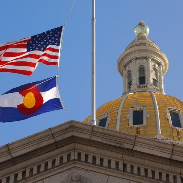 Capitol building with US and Colorado flags flying