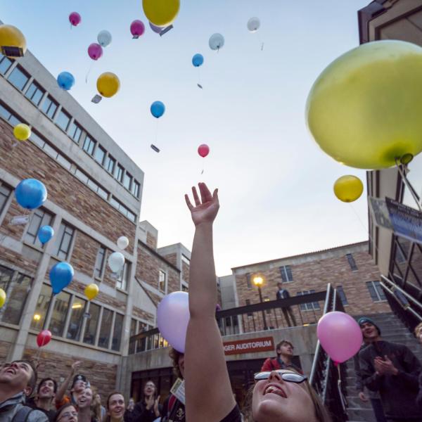 Students release biodegradable balloons as part of class project